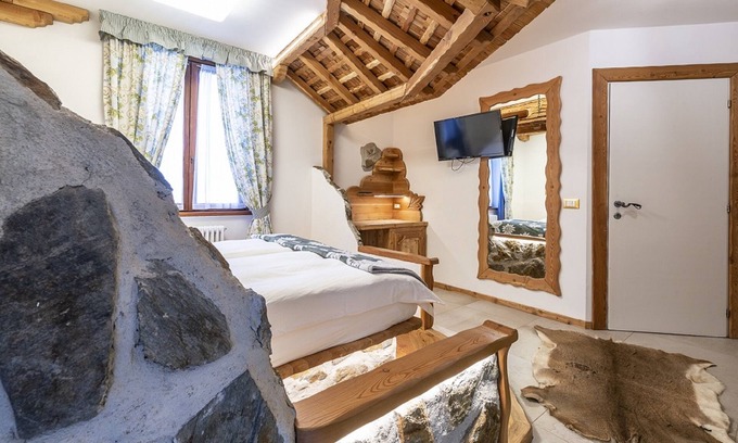 Pellizzano Hotel | Discover Hotel Arcangelo: Family-Friendly Getaway with Spa