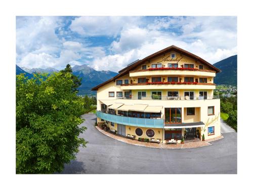 Arzl im Piztal Hotel | Discover Hotel Arzlerhof: 4-Star Retreat with Pool Access