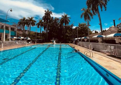Girardot Hotel | Relax at Hotel Bachue Girardot with Pool and Ocean Views