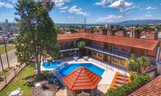 Villa Carlos Paz Hotel | Discover Hotel Carlos Paz: Oceanfront Retreat with Pool