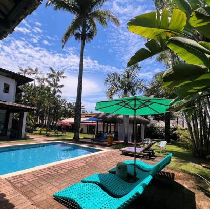 Balneario Praia do Pernambuco Hotel | Discover Pousada Casa Paradiso Guarujá with Oceanfront Bliss