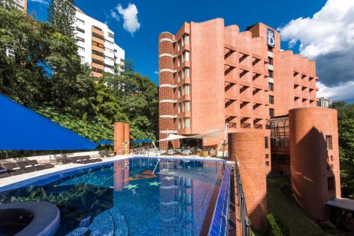 Castropol Hotel | Elegant Hotel Dann Carlton Belfort Medellin with Ocean Views