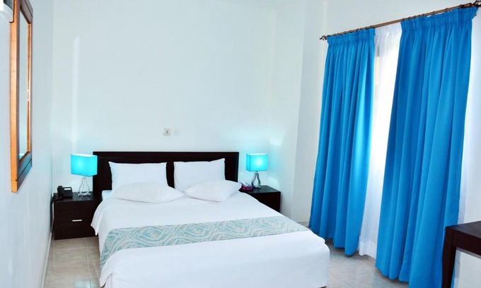 Angre Hotel | Discover Hotel Djigui: Cozy Stay with Breakfast & Dining