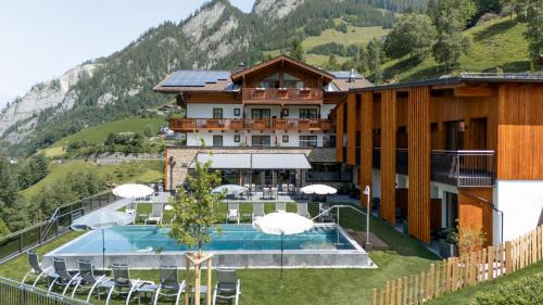 Grossarl Hotel | Hotel Dorfer: Oceanfront Retreat with Spa & Pool Access