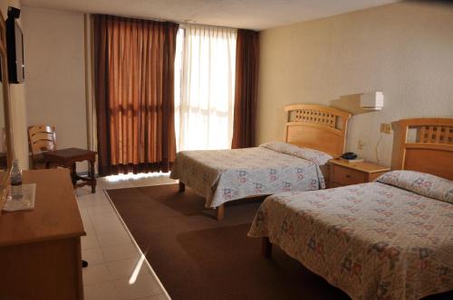 Centro Hotel | Discover Hotel El Monte: Family-Friendly with Breakfast Included