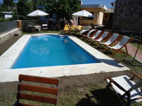La Falda Hotel | Pet-Friendly Hotel El Nogal with Pool and Family Amenities