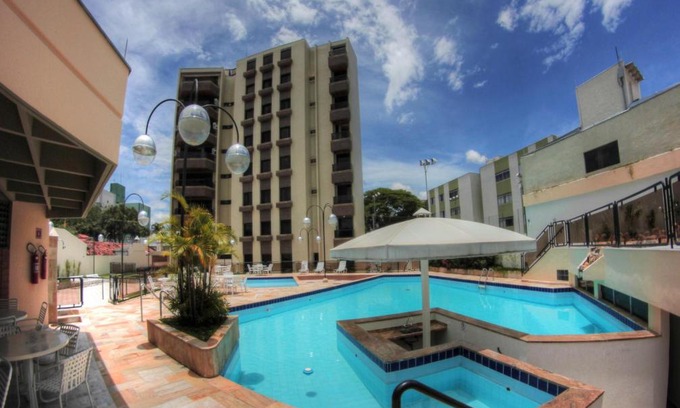 Sao Jose dos Campos Hotel | Discover Hotel Ema Palace: Family-Friendly with Pool & Hot Tub