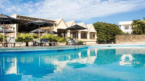 San Juan Bautista Hotel | Discover Hotel Faranda Guayacanes: Family-Friendly & Oceanfront
