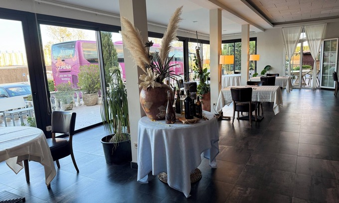 Llers Hotel | Discover Hotel Figueres Parc: Relax by the Pool & Spa