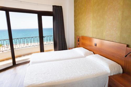 Calella Hotel | Explore Hotel Haromar: Poolside Retreat with Ocean Views