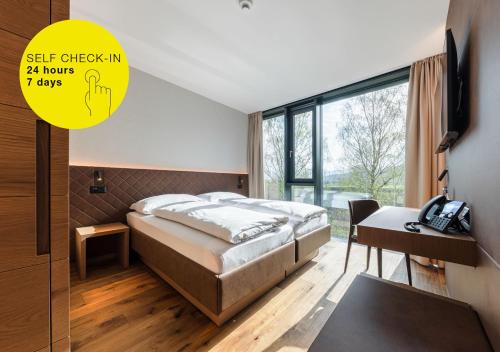 Ruggell Hotel | Discover Hotel Kommod: Pet-Friendly with Hot Tub Access