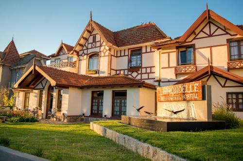 La Falda Hotel | Discover Hostal L' Hirondelle: Rated 9/10 with Pool & Hot Tub