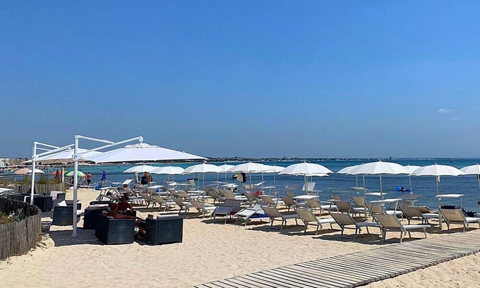 Torre Lapillo Hotel | Relax at Hotel la Spiaggia: Ocean Views & Family-Friendly