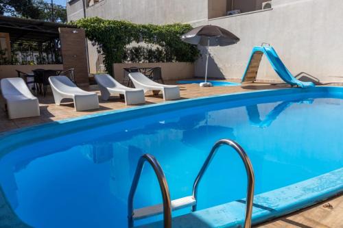 Foz do Iguacu City Centre Hotel | Discover Hotel Lawrence: Oceanfront Retreat with Pool & Spa