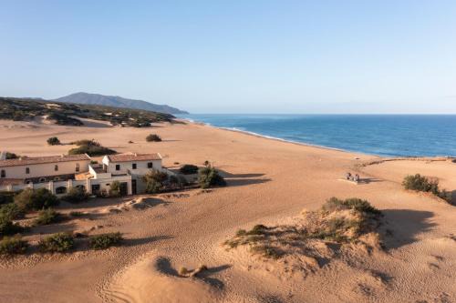 Arbus Hotel | Experience Hotel Le Dune Piscinas: 5-Star Relaxation Awaits
