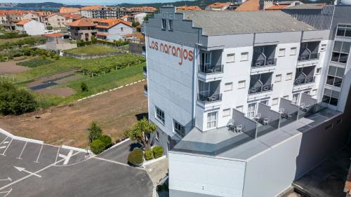 Sanxenxo Hotel | Oceanfront Hotel Los Naranjos with Pool & Family Amenities