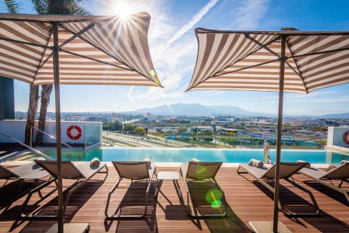 Carretera de Cadiz Hotel | Experience Hotel Málaga Vibes: Pet-Friendly with Ocean Views