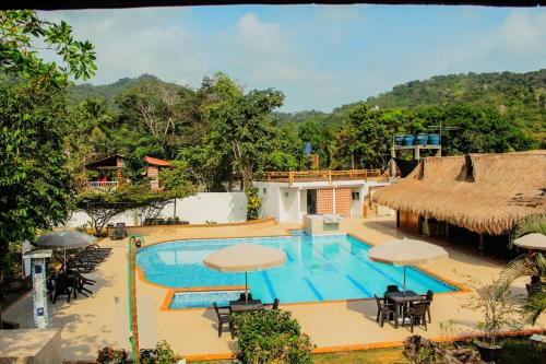 Capurgana Hotel | Discover Comfort at Hotel Mares Capurganá with Pool & Hot Tub