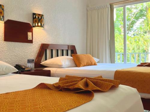 Palenque Hotel | Discover Hotel Maya Palenque: Family-Friendly with Pool