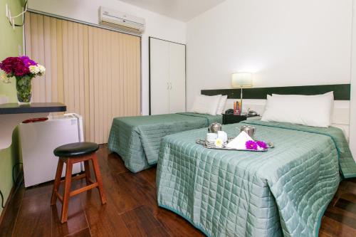 Leopoldina Hotel | Discover Hotel Minas Tower: Family-Friendly with Pool & Dining