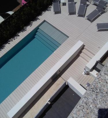 Cala Gonone Hotel | Experience Hotel Nettuno: Oceanfront Oasis with Pool