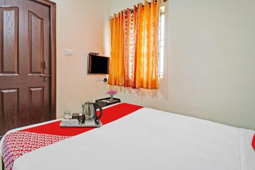 Madiwala Hotel | Budget-Friendly OYO Mn Residency Near Ragigudda Temple