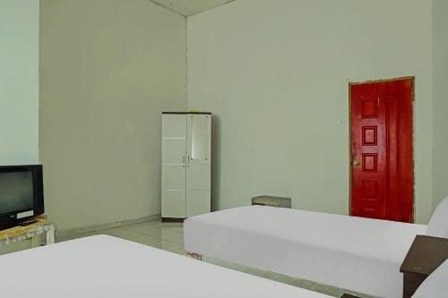 Kalimantan Hotel | Budget-Friendly Stay at SPOT ON 92390 Wilma Kost Syariah