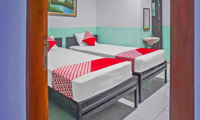 Makassar Hotel | Budget-Friendly OYO 90856 Wisma Favorite in Makassar