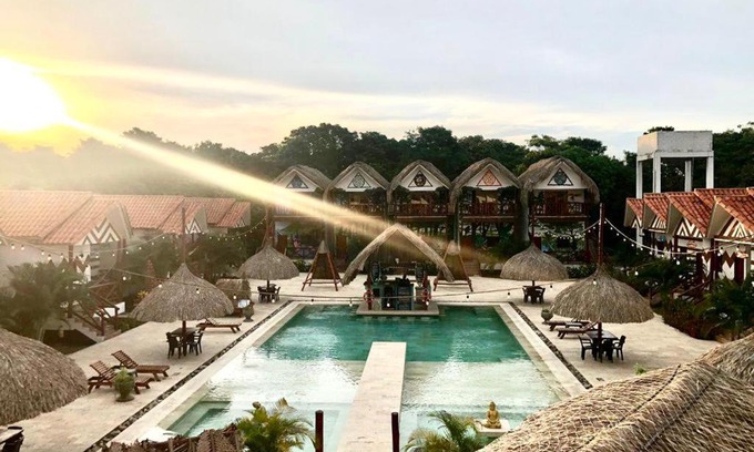 Palomino Hotel | Relaxing Palmares Beach Retreat with Pool and Ocean View