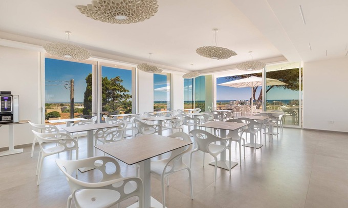 Torre Pali Hotel | Indulge at Perla Saracena Suites - Comfort and Amenities Await
