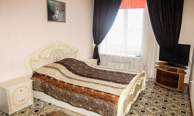 Krasnoturinsk Hotel | Comfortable Stay at Hotel Prometey with Breakfast & Kitchen