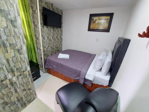 Fontibon Hotel | Budget-Friendly Hotel Punto 100 with Breakfast & Family Perks