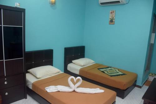 Kampung Telaga Papan Hotel | Discover HOTEL RAUDHAH Kerteh: Family-Friendly Retreat