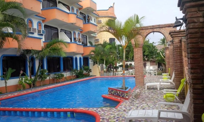 Tecolutla Municipality Hotel | Discover Hotel Real del Quijote: Family-Friendly Retreat