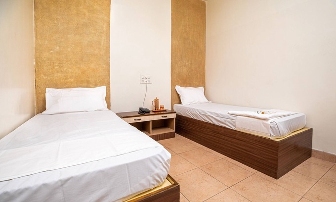 Gandhipuram Hotel | Budget-Friendly Hotel Sapthagiri Nest with Family Amenities
