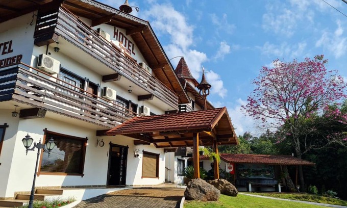 Treze Tilias Hotel | Discover Hotel Schneider: Family-Friendly with Hot Tub & Breakfast