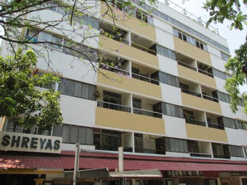 Shivajinagar Hotel | Budget-Friendly Hotel Shreyas: Family-Friendly Comfort Awaits