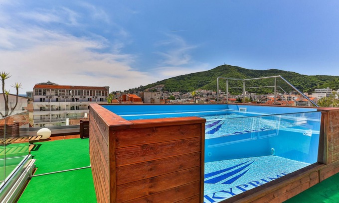 Maini Hotel | Eco-Friendly Retreat at Hotel Skyprime with Pool & Dining