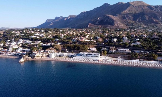 Torre Colonna-sperone Hotel | Relax at Hotel Sporting Club: 4-Star Stay with Ocean Views