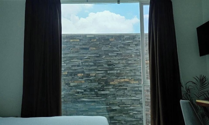 Tonala Hotel | Hotel & Suites Punto Oriente