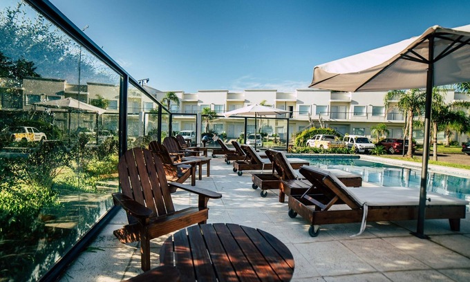 Gualeguaychu Hotel | Relax at Hotel Tagüé: Pool, Spa & Family-Friendly Fun