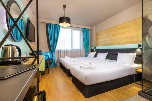 Plovdiv Hotel | Discover Hotel Urban: Poolside Relaxation & Family Fun Awaits