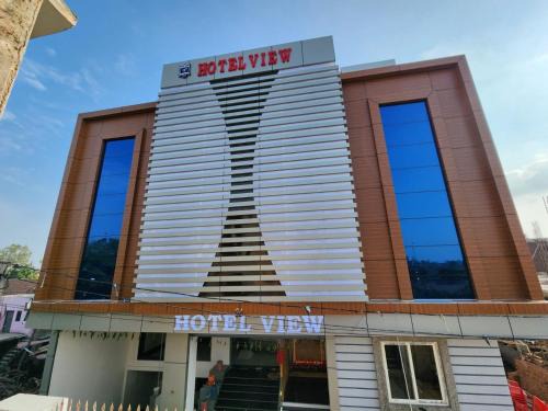 Govardhan Hotel | Cozy Hotel View: Pet-Friendly Stay with Breakfast Included