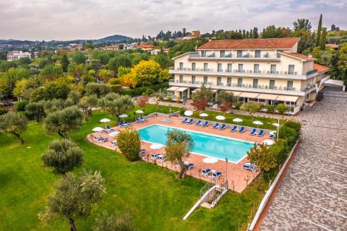 Moniga del Garda Hotel | Enchanting Front Lake Hotel: Villa Paradiso Suite Awaits