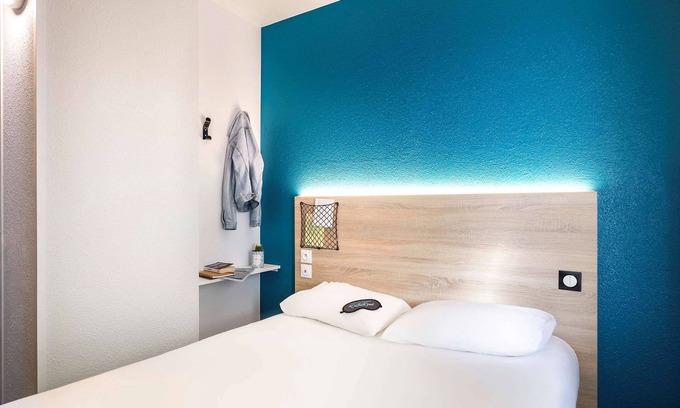 Le Vaudreuil Hotel | Modern Comfort at HotelF1 Louviers with Family-Friendly Amenities