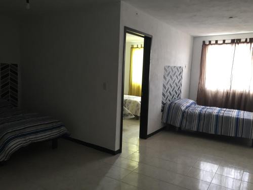 Cuautlancingo House | Discover Hotelito Ejido: Family-Friendly Getaway