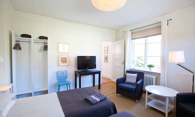 Vanersborg Hotel | Discover Hotell 46an: Eco-Friendly Stay with Pool & Breakfast