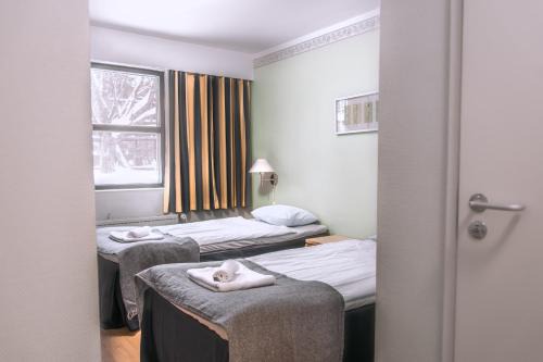 Kauniainen Apartment | Welcoming Hotelli Tiiliriihi: Family-Friendly & Accessible