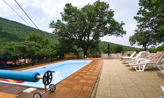 Golovik House | House Golovik: Oceanfront Getaway with Private Pool