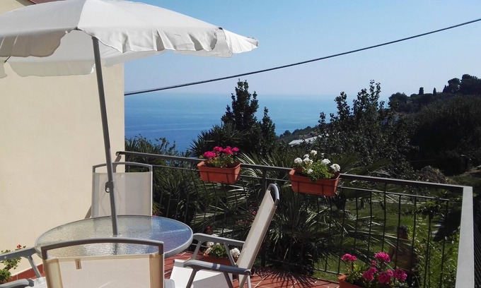 Costarainera House | Seaside Retreat in Medieval Village with Garden Terrace